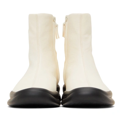 Shop The Row Grained Town Bootie In Milk