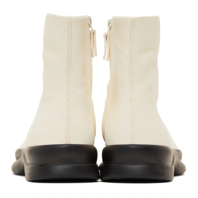 Shop The Row Grained Town Bootie In Milk