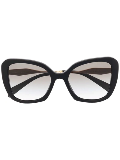 Shop Prada Oversize Frame Sunglasses In Black