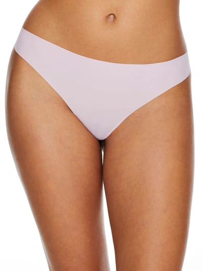 Shop Calvin Klein Invisibles Thong In Pale Orchid