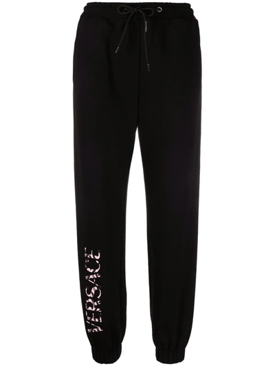 Shop Versace Logo-appliqué Sweat Pants In Schwarz