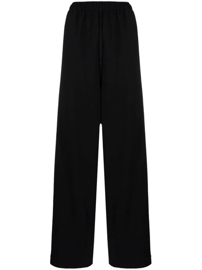 Shop Balenciaga Embroidered-logo Wide-leg Trousers In Black