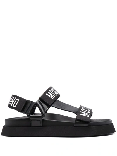 Shop Moschino Logo-print Flat Sandals In Black