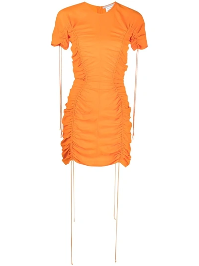 Shop Stella Mccartney Ruched Fitted Dress In Orange