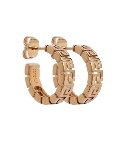 Shop Versace Greca Hoop Earrings In  Gold