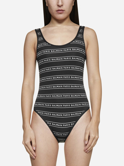 Shop Balmain Logo-tape Striped Swimsuit