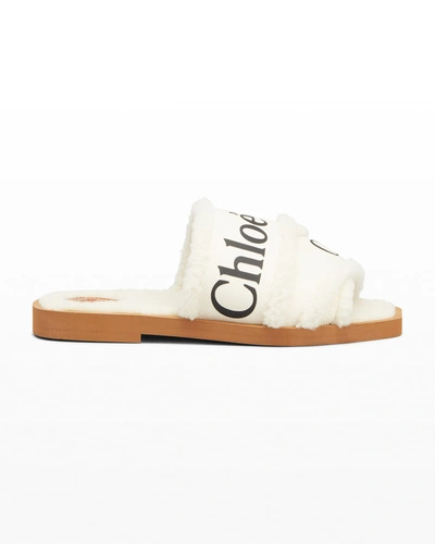 Shop Chloé Woody Shearling Logo Flat Sandals In White