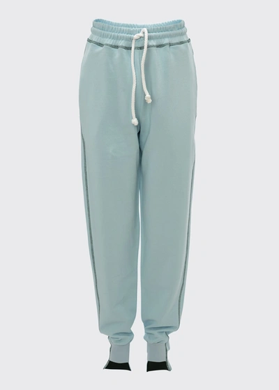 Shop Jw Anderson Tapered Drawstring Track Pants In Baby Blue