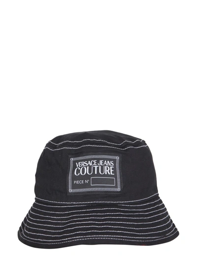 Shop Versace Jeans Couture Logo Patch Bucket Hat In Black