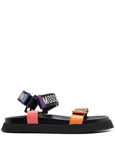 Shop Moschino Logo Strappy Platform Sandals In 00b Black