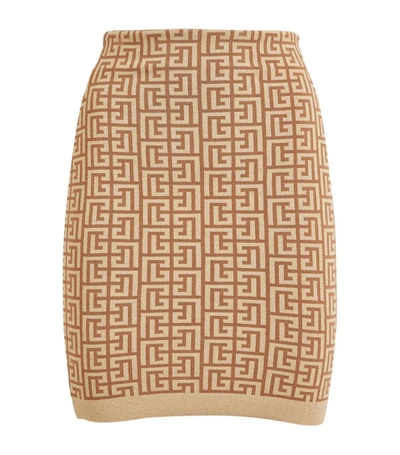 Shop Balmain Glitter Monogram Mini Skirt In Brown
