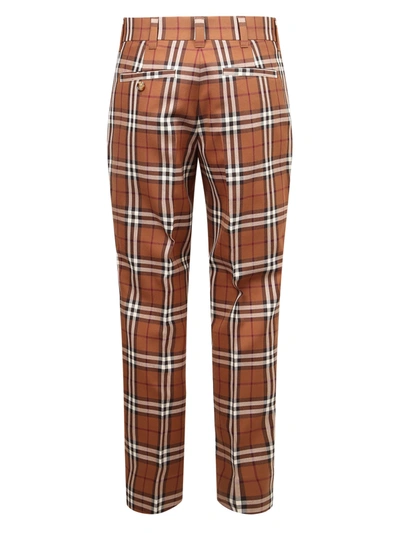 Shop Burberry Check Trousers In Brown