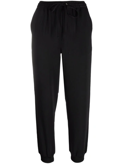 Shop Lauren Ralph Lauren Striped Tapered Trousers In Schwarz