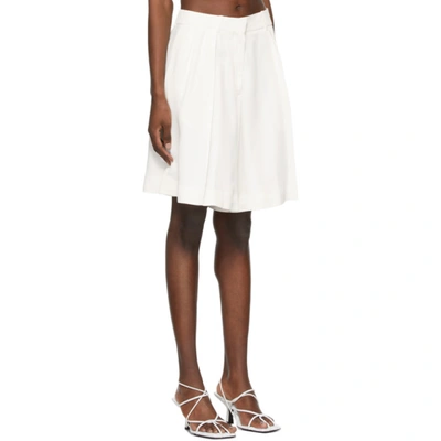 Shop Khaite Off-white Crêpe 'the Isabelle' Shorts In Ivory