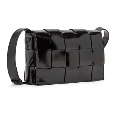 Shop Bottega Veneta Black Intreccio Cassette Bag In 8425 Black/gold