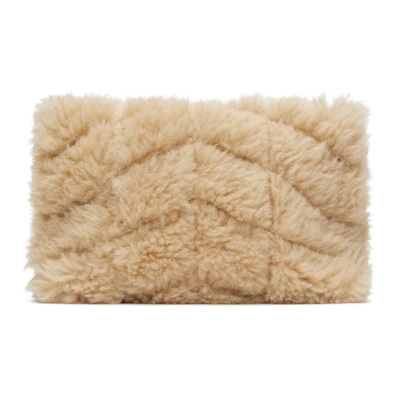 Shop Saint Laurent Puffy Shearling Pouch In 9540 Natural Beige