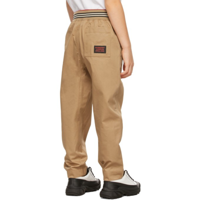 Shop Burberry Kids Beige Icon Stripe Waistband Trousers In Archive Beige