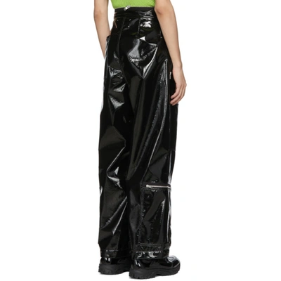 MAISON MARGIELA BLACK SHINY COATED ZIP TROUSESR