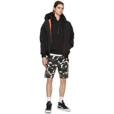 Shop Aape By A Bathing Ape Black Embossed Logo Hoodie In Blackbkx