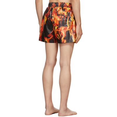 Shop Vetements Red & Black 'limited Edition' Fire Swim Shorts In Fire Print