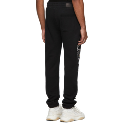 Shop Amiri Leopard Appliqué Lounge Pants In Black
