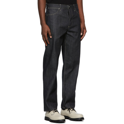 Shop Jil Sander Indigo Regular Raw Jeans In 405 Dark Blue