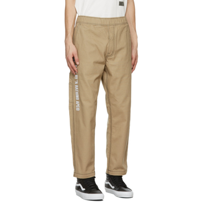 Shop Aape By A Bathing Ape Beige Embroidered Logo Chino Trousers In Beigebgx