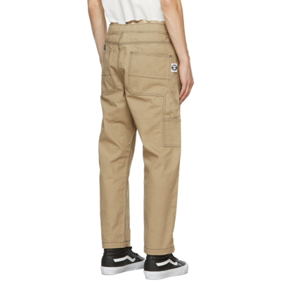 Shop Aape By A Bathing Ape Beige Embroidered Logo Chino Trousers In Beigebgx