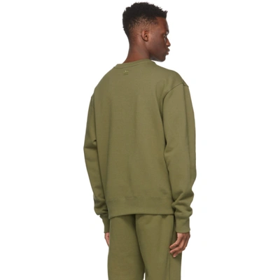 Shop Adidas Originals By Pharrell Williams Khaki Basics Sweatshirt In Olive Cargo