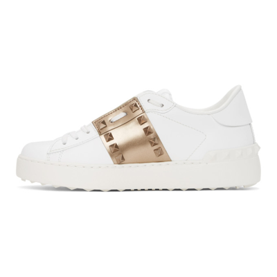 Shop Valentino White Rockstud Untitled Sneakers In 155 White/gold