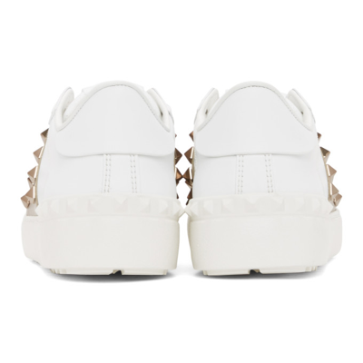 Shop Valentino White Rockstud Untitled Sneakers In 155 White/gold