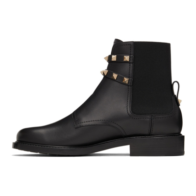 Shop Valentino Double Strap Flat Rockstud Ankle Boots In 0no Black
