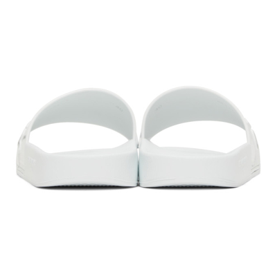 Shop Givenchy Logo Flat Sandals In 100 White