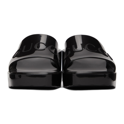 Shop Gucci Black Rubber Slide Sandals In 1000 Nero
