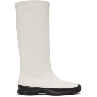 The Row Town Tall Boots In Milk | ModeSens