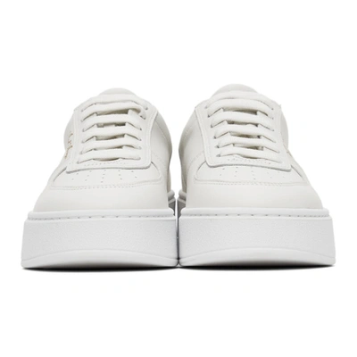 Shop Axel Arigato White Orbit Sneakers