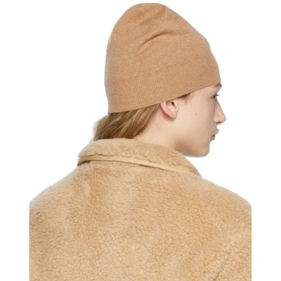 Shop Burberry Tan Cashmere Graphic Logo Beanie In Camel