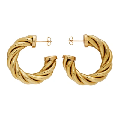 Shop Laura Lombardi Gold Large Spira Hoop Earrings In Brass