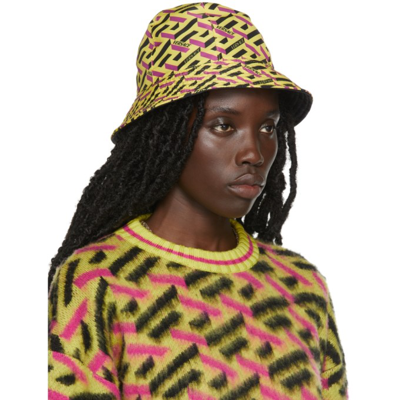 Shop Versace Yellow Monogram Print Bucket Hat In 2y000 Yello