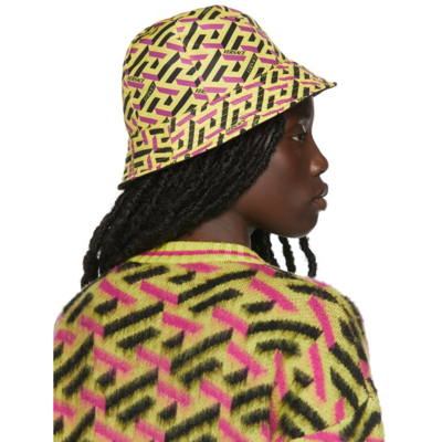 Shop Versace Yellow Monogram Print Bucket Hat In 2y000 Yello