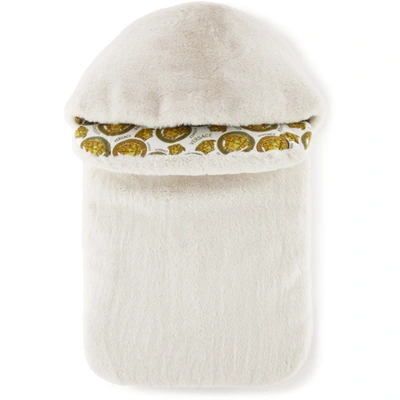 Shop Versace Baby Off-white Faux-fur Nest Sleeping Bag In 2w110 White+gold