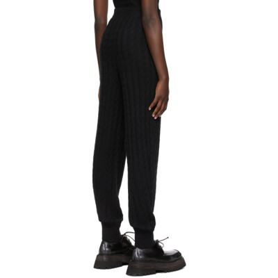 Shop Totême Cashmere Cable Knit Lounge Pants In 200 Black