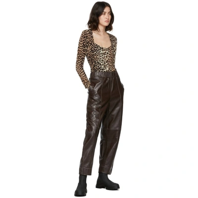 Shop Ganni Long Sleeve Bodysuit In 943 Leopard