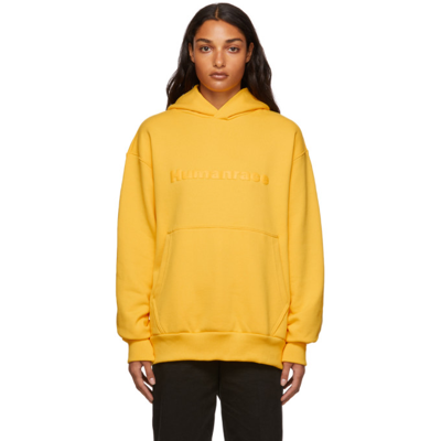 Shop Adidas X Humanrace By Pharrell Williams Ssense Exclusive Humanrace Tonal Logo Hoodie In Bold Gold