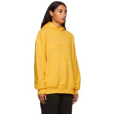 Shop Adidas X Humanrace By Pharrell Williams Ssense Exclusive Humanrace Tonal Logo Hoodie In Bold Gold