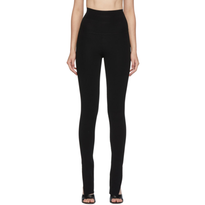 Shop Khaite Stretch Rooney Leggings In 200 Black