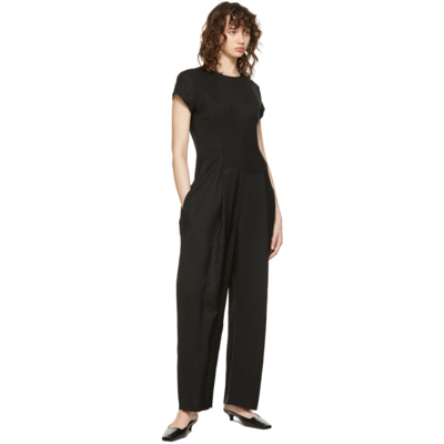 Shop Totême Black Business Jumpsuit In 200 Black