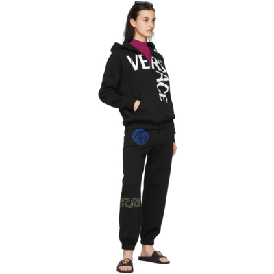 Shop Versace Black Oversized Logo Hoodie In 2b020 Black White