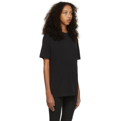 Shop Skims Black Stretch Boyfriend T-shirt In Onyx