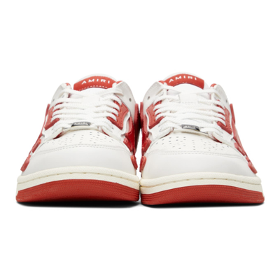 Shop Amiri Skel Top Low Sneakers In White / Red